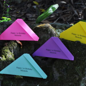 Four colorful personalized birthday butterfly release envelopes