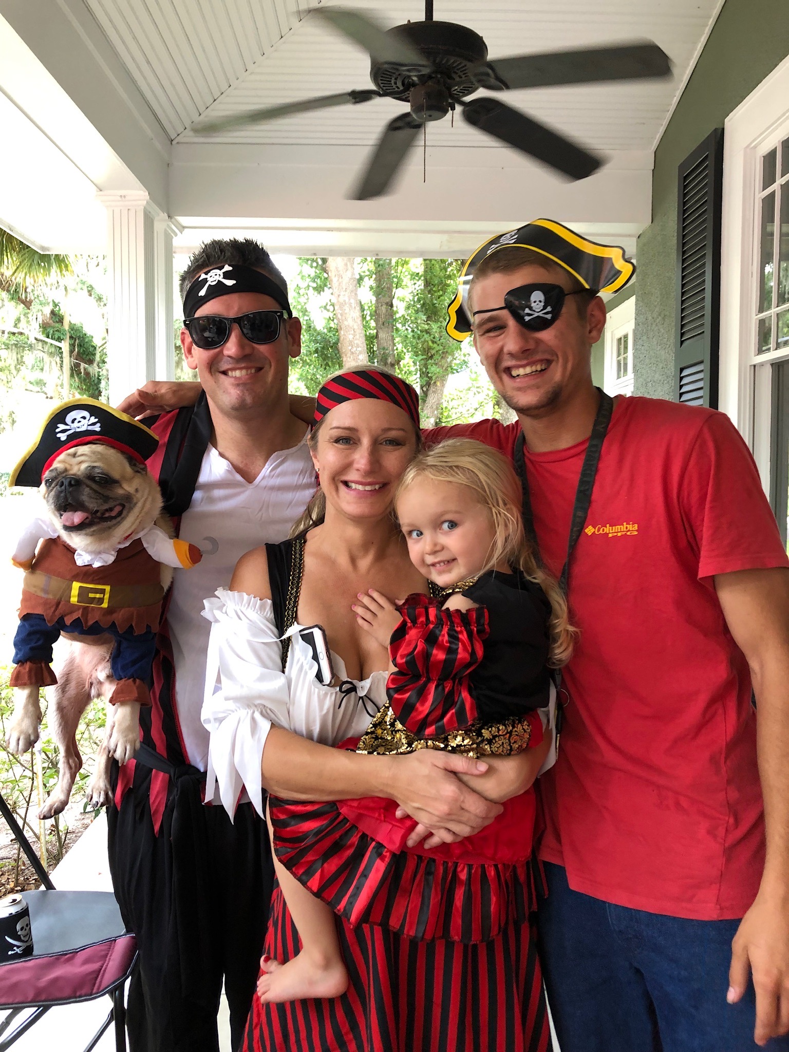 A pirate-themed family portrait of Cloverlawn Butterflies team